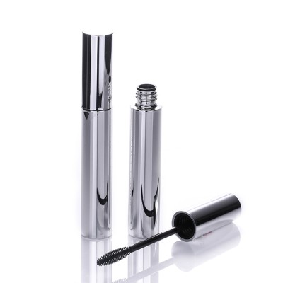 Silver shiny plastic empty mascara bottle with silicone wand